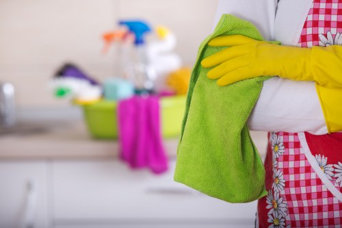 Staff using protective gear during carpet cleaning